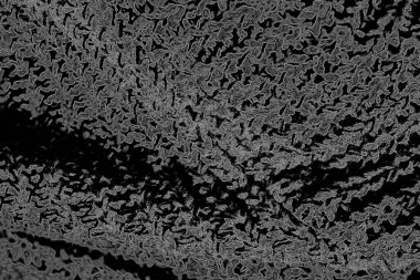 Çizik ve çatlaklarla dolu pis bir doku.