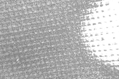 Çizik ve çatlaklarla dolu pis bir doku.