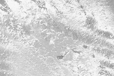 Çizik ve çatlaklarla dolu pis bir doku.