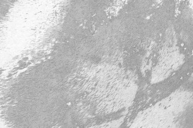 Çizik ve çatlaklarla dolu gri bir doku.