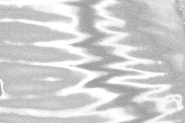 Çizik ve çatlaklarla dolu gri bir doku.