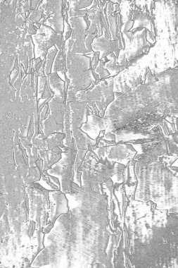 Çizik ve çatlaklarla dolu gri bir doku.