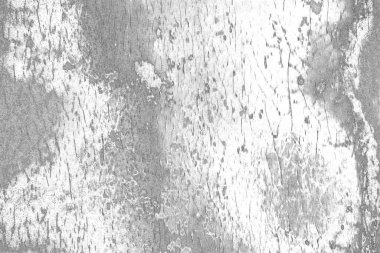 Çizik ve çatlaklarla dolu gri bir doku.