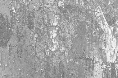 Çizik ve çatlaklarla dolu gri bir doku.