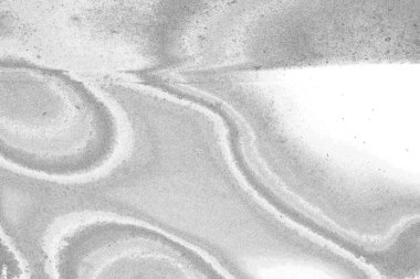 Çizik ve çatlaklarla dolu gri bir doku.