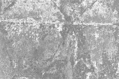 Çizik ve çatlaklarla dolu gri bir doku.