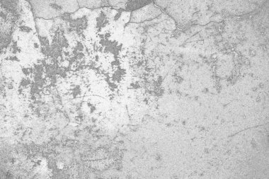 Çizik ve çatlaklarla dolu gri bir doku.