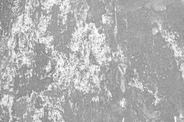 Çizik ve çatlaklarla dolu gri bir doku.