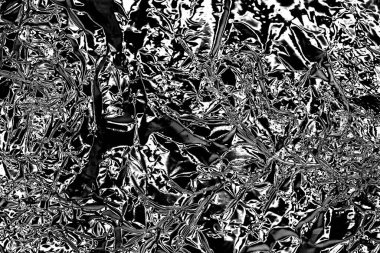 Çizik ve çatlaklarla dolu gri bir doku.