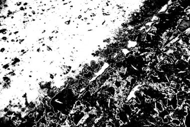 Çizik ve çatlaklarla dolu gri bir doku.