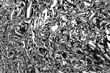 Çizik ve çatlaklarla dolu gri bir doku.