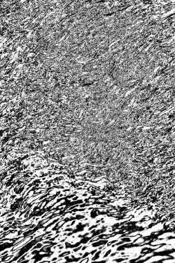 Çizik ve çatlaklarla dolu gri bir doku.