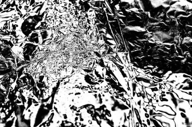 Çizik ve çatlaklarla dolu gri bir doku.