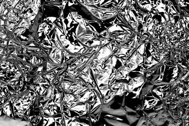 Çizik ve çatlaklarla dolu gri bir doku.