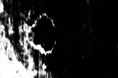 Çizik ve çatlaklarla dolu gri bir doku.