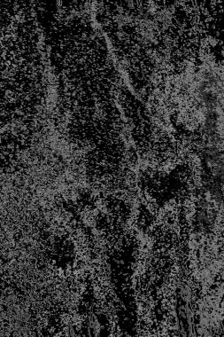 Çizik ve çatlaklarla dolu gri bir doku.