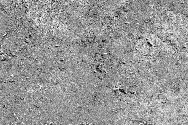 Çizik ve çatlaklarla dolu gri bir doku.