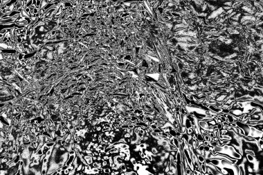 Çizik ve çatlaklarla dolu gri bir doku.