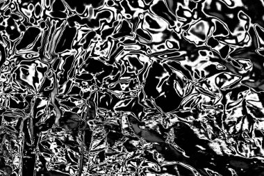 Çizik ve çatlaklarla dolu gri bir doku.