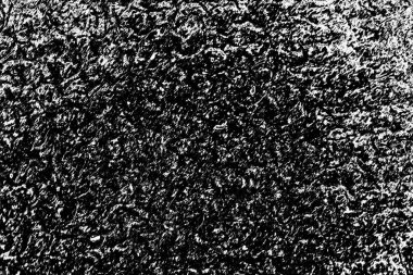 Çizik ve çatlaklarla dolu gri bir doku.