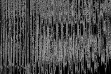 Çizik ve çatlaklarla dolu gri bir doku.