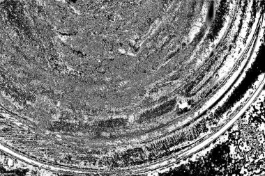 Çizik ve çatlaklarla dolu gri bir doku.