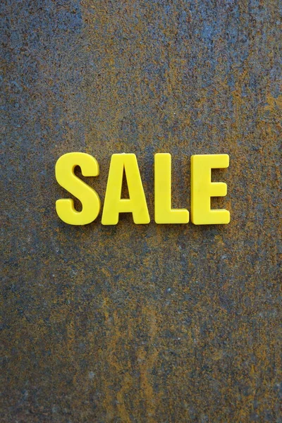 Sale concept. Yellow letters on background