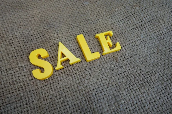 Sale Concept Yellow Letters Background — Stock Photo, Image