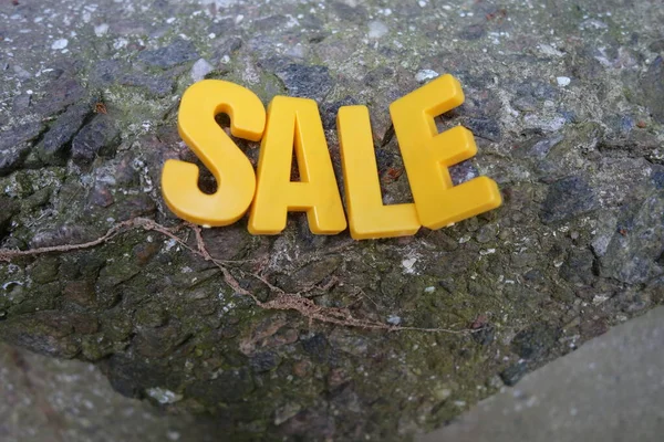 Sale Concept Yellow Letters Background — Stock Photo, Image