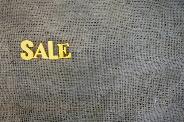 Sale concept. Yellow letters on background