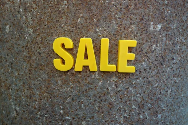 Sale Concept Yellow Letters Background — Stock Photo, Image