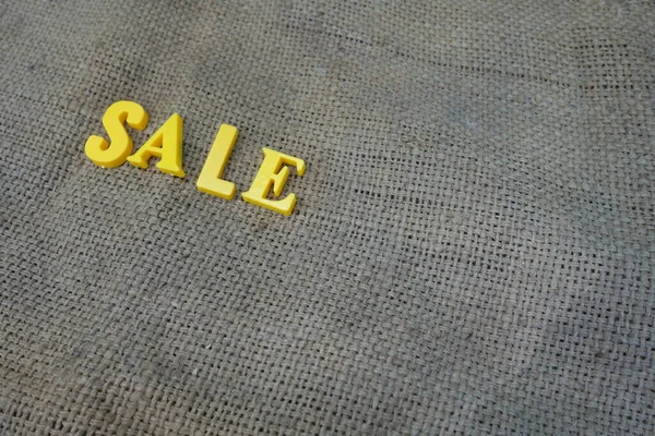 Sale Concept Yellow Letters Background — Stock Photo, Image