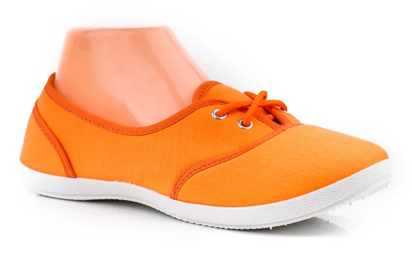 Une image de chaussures de sport orange pas cher — Photo