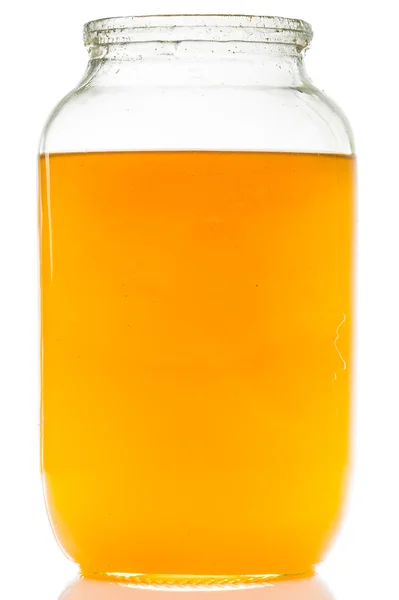 Een afbeelding van pot honing geïsoleerd op witte achtergrond — Stockfoto