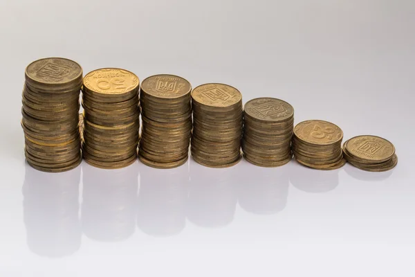 Graf hospodářského růstu v podobě mincí — Stock fotografie