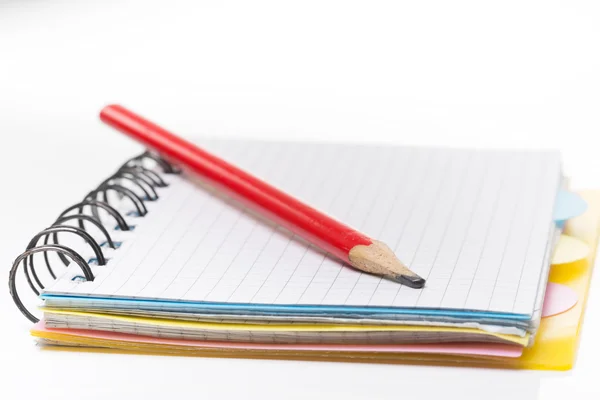 Notebook with pencil on white background — Stock Photo, Image