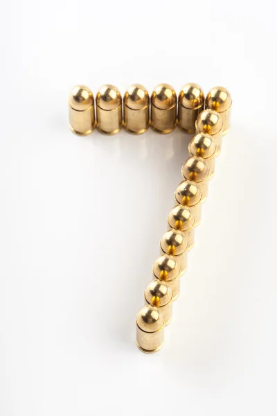 Numbers made of 9 mm cartridges on white background — Stock Photo, Image