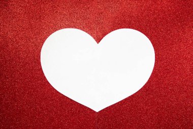 white heart on a red shiny background. Valentines Day