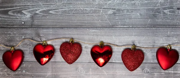 Red hearts on a wooden background. valentines day — Stock Photo, Image