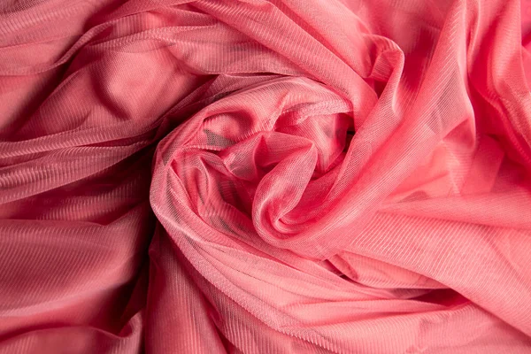 Pembe buruşuk tül kumaş. kumaş arkaplanı