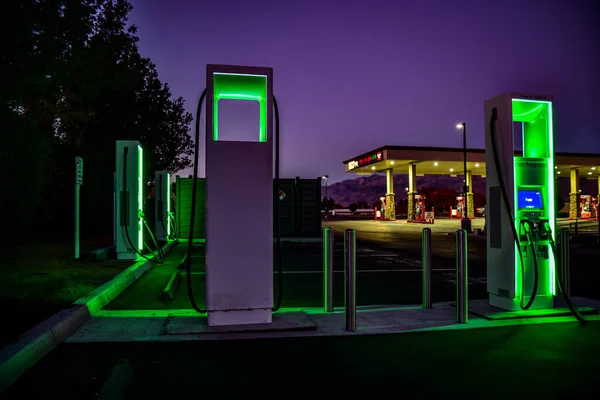 electric power station with green lights at night