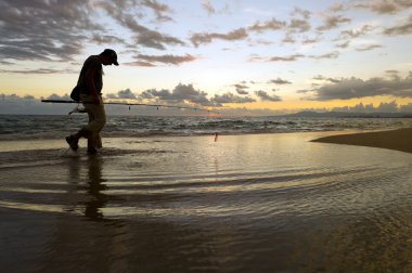 Balıkçı siluet günbatımı
