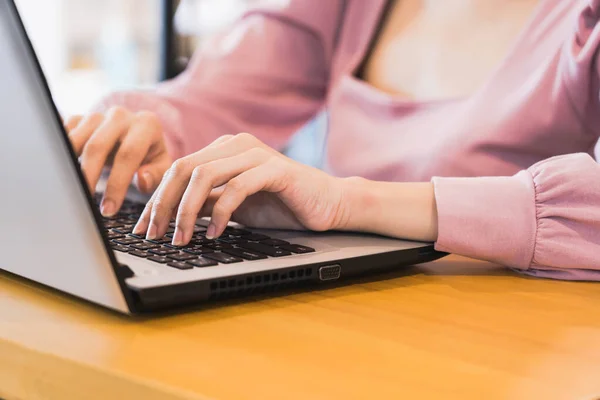 stock image Cropped of Young business woman typing work on laptop at office.