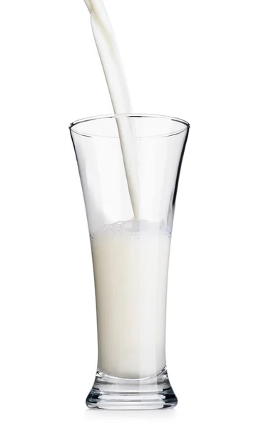 Pouring milk in glass — Stock Photo, Image