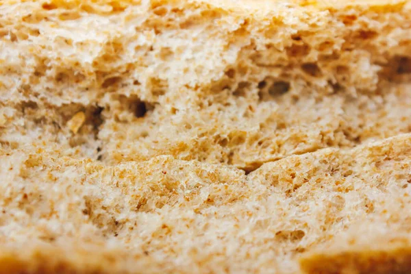 Braunes Brot Textur.in Scheiben geschnitten.Poren von Brot — Stockfoto