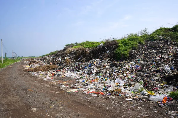 Mountain of garbage, large garbage pile, Pile of stink and toxic residue. These garbage come from urban areas, industrial areas.