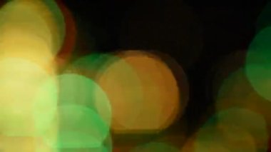 Bokeh odaklanmış ışıkları, Light Bokeh videosu olan şenlikli soyut arkaplan.