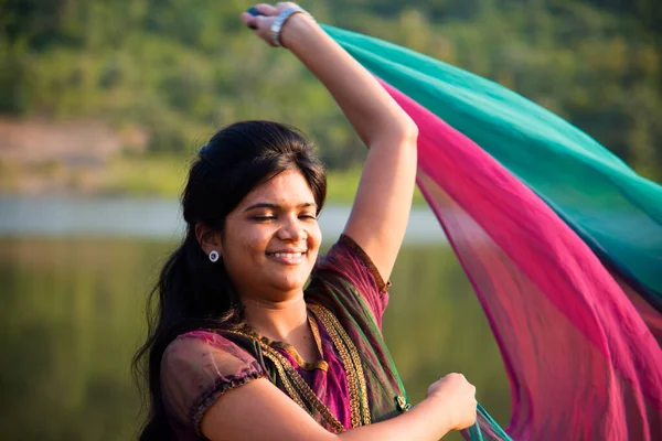 Young Happy Indian Girl Playing Her Pink Scarf Outdoor — Foto Stock