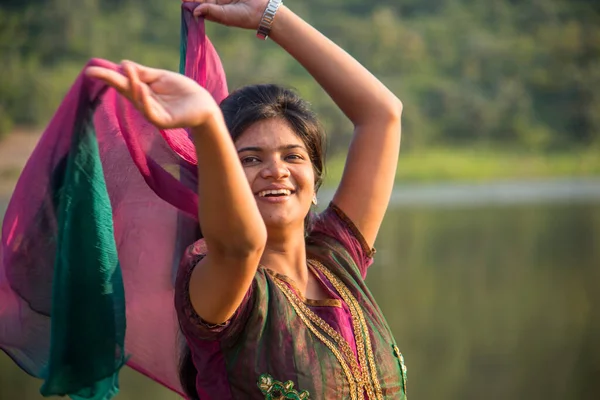 Young Happy Indian Girl Playing Her Pink Scarf Outdoor — Foto Stock