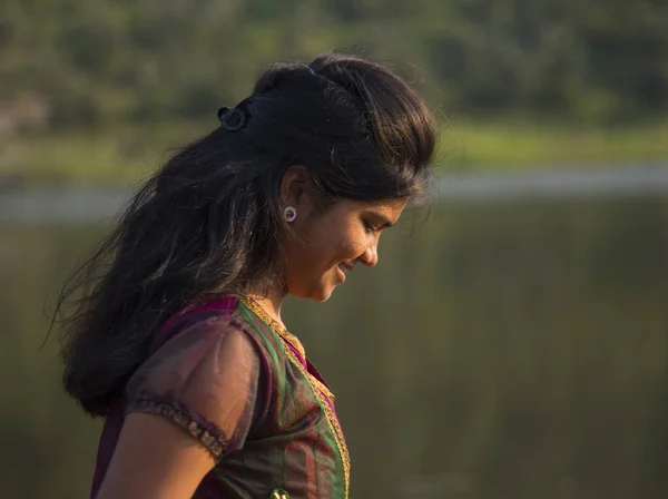 Young Happy Indian Girl Playing Her Pink Scarf Outdoor — Stockfoto